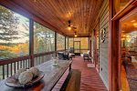 Expansive screened in porch off of entry level family room